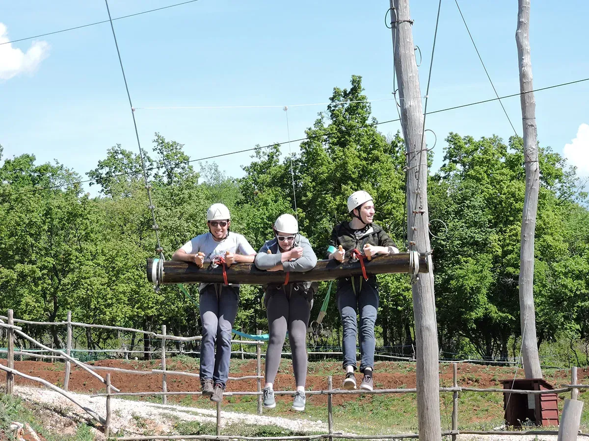 Guest on the 12.5 m high swing above the forest at Glavani Park, Istria