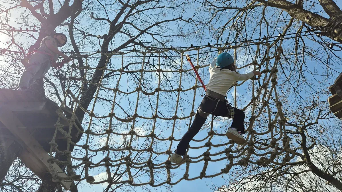 Guest on the yellow training route treetop course at Glavani Park, Istria