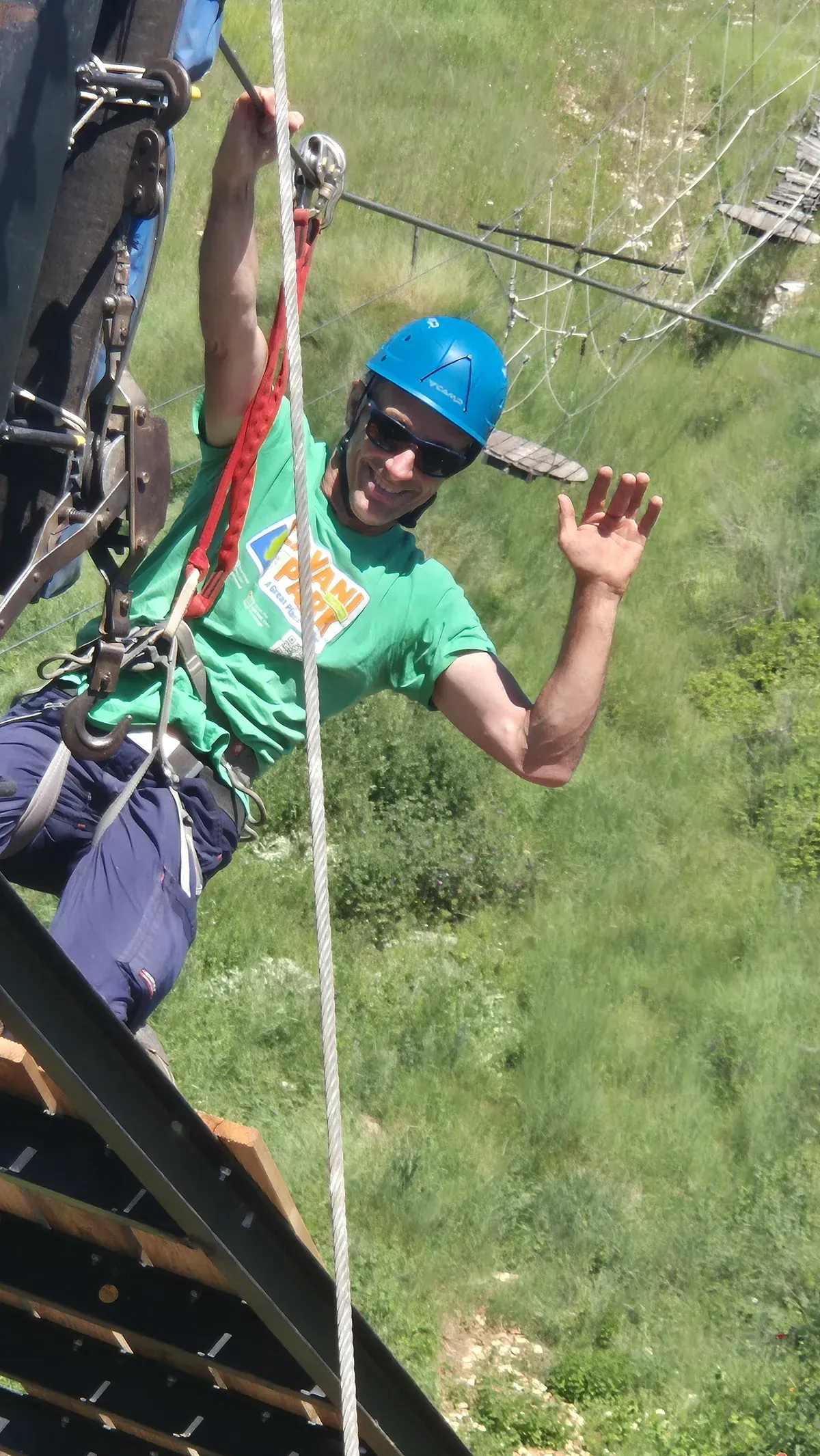 Instructor on the Big Zipline above the forest at Glavani Park, Istria